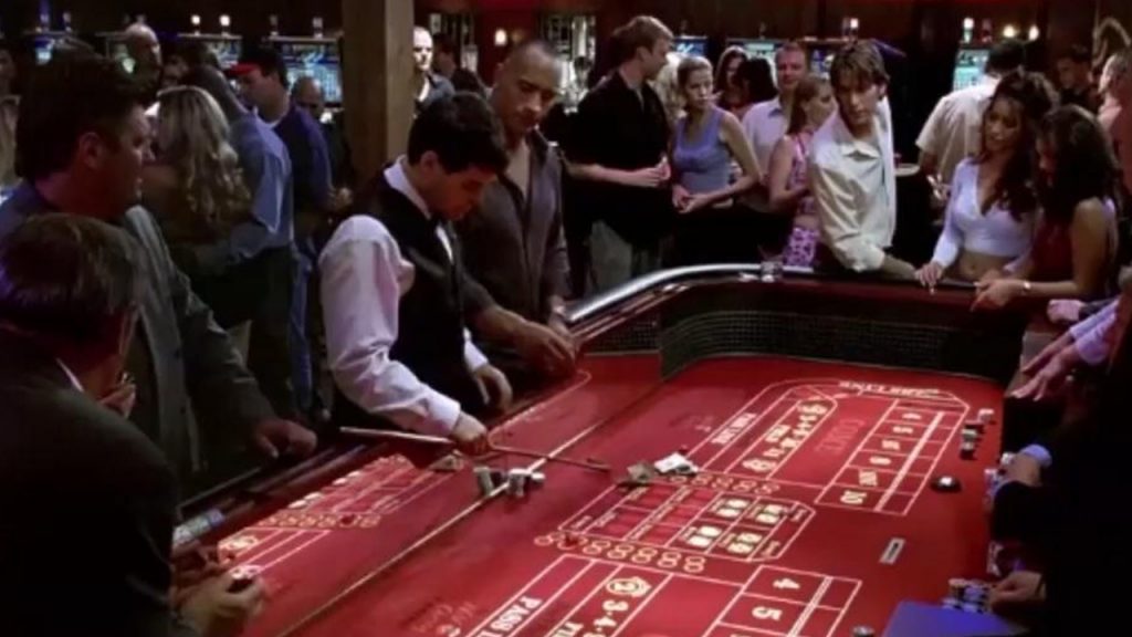 Boulder Johnson and friends in the casino gambling money, see someone cheating on the angry beat people.